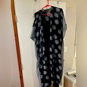 26/28 jumpsuit with a cover.